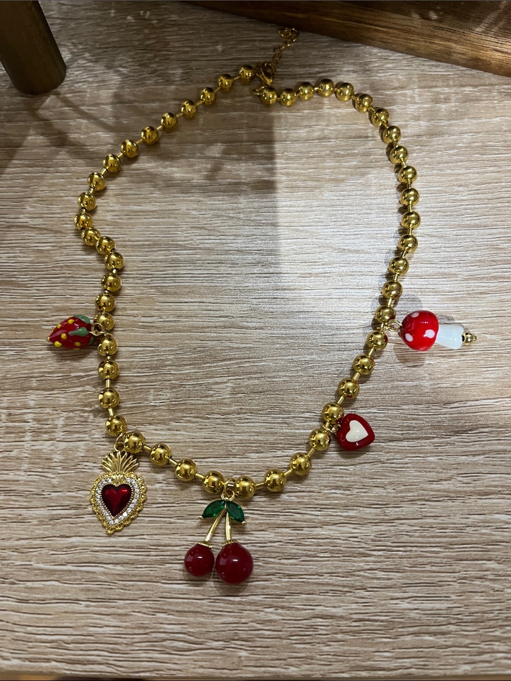 Gold Beaded Necklace with Red Cherry and Heart Charms by